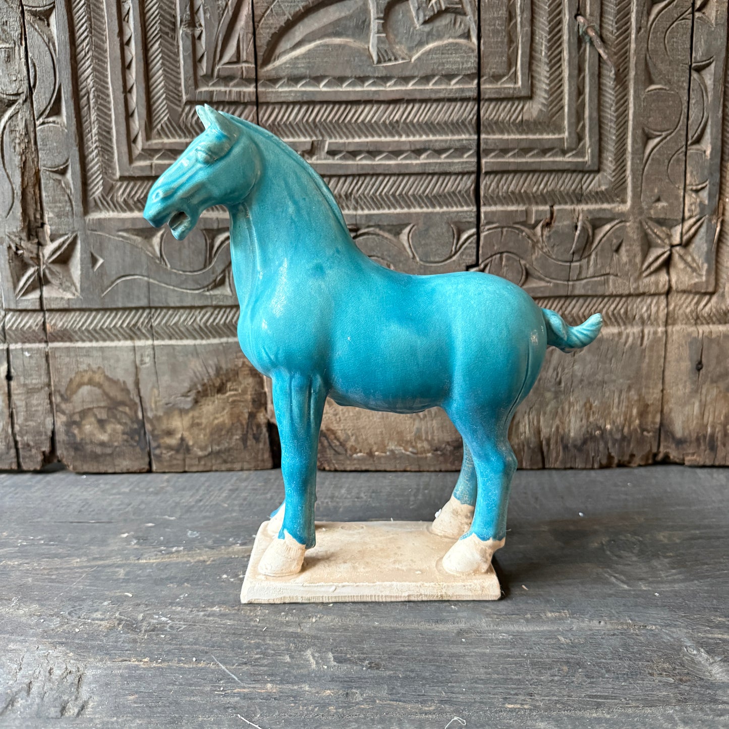 Terracotta horse blue looking left