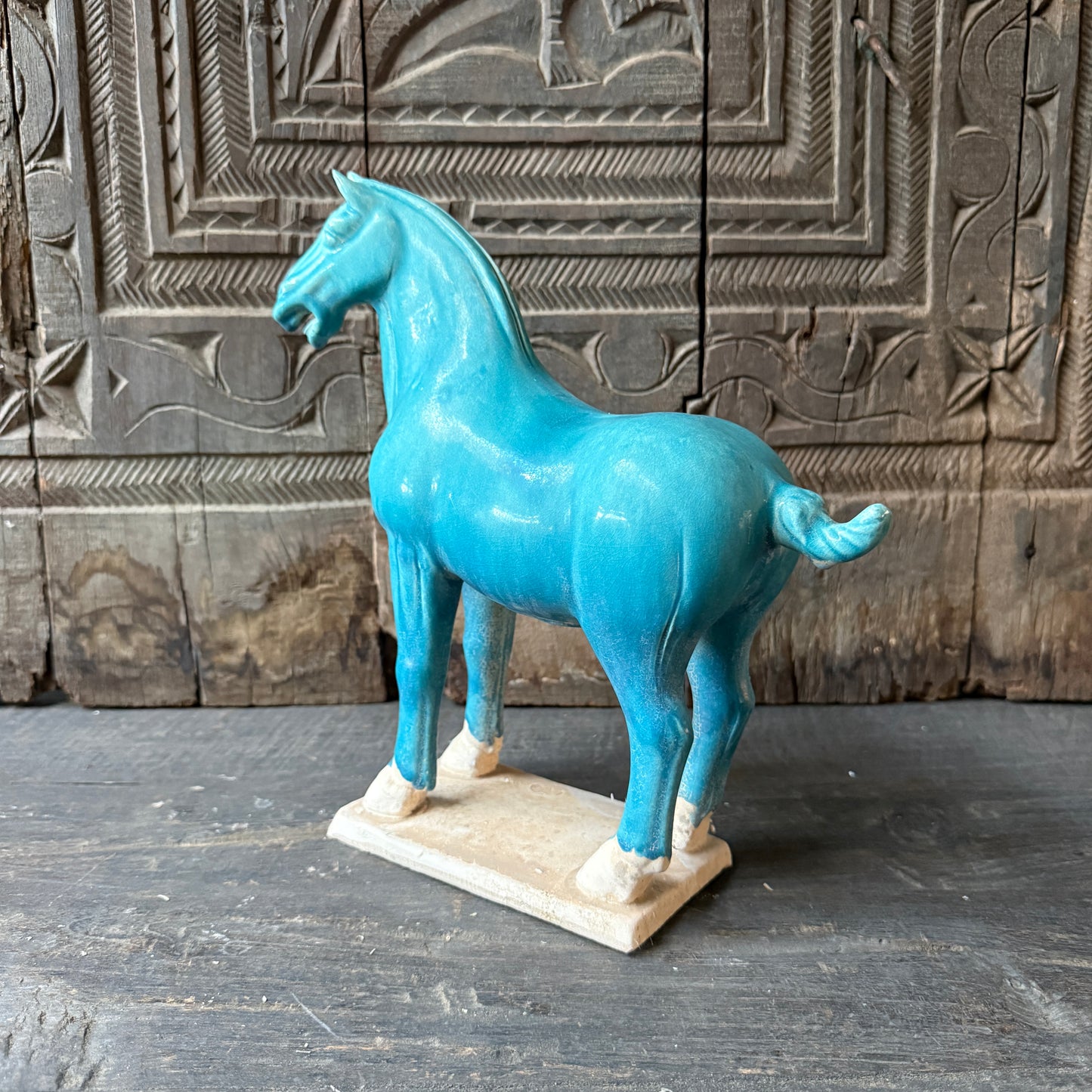 Terracotta horse blue looking left