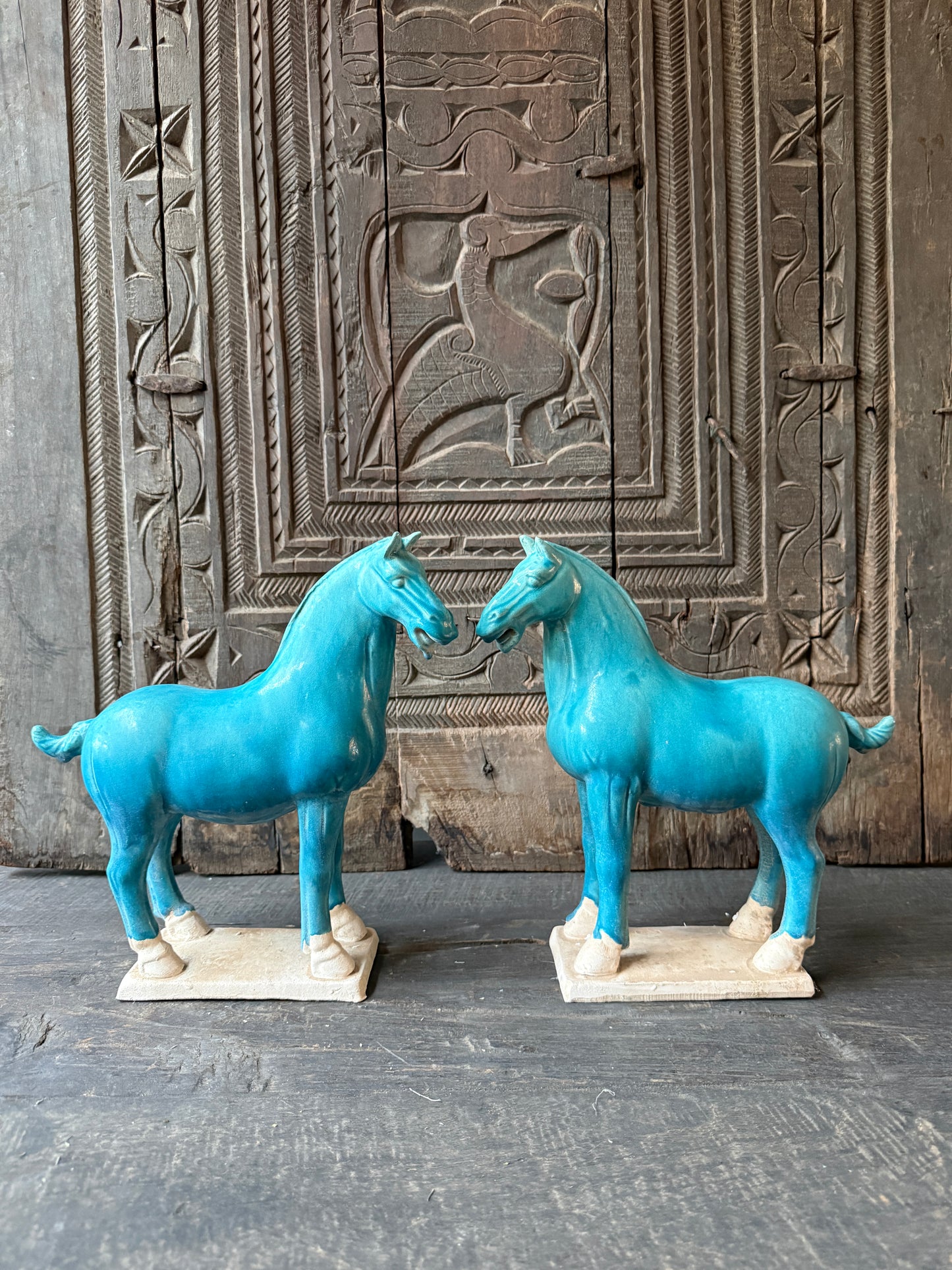 Terracotta horse blue looking left